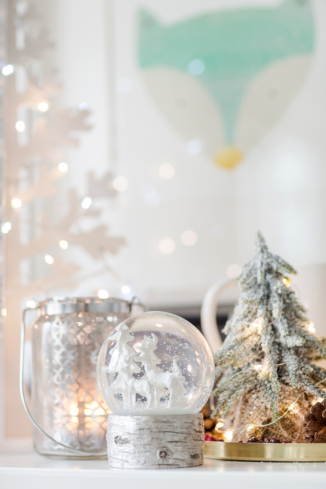 Simple Christmas decorations with twinkly lights and snow.